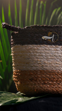 Textured pouch with a logo on a green leaf background