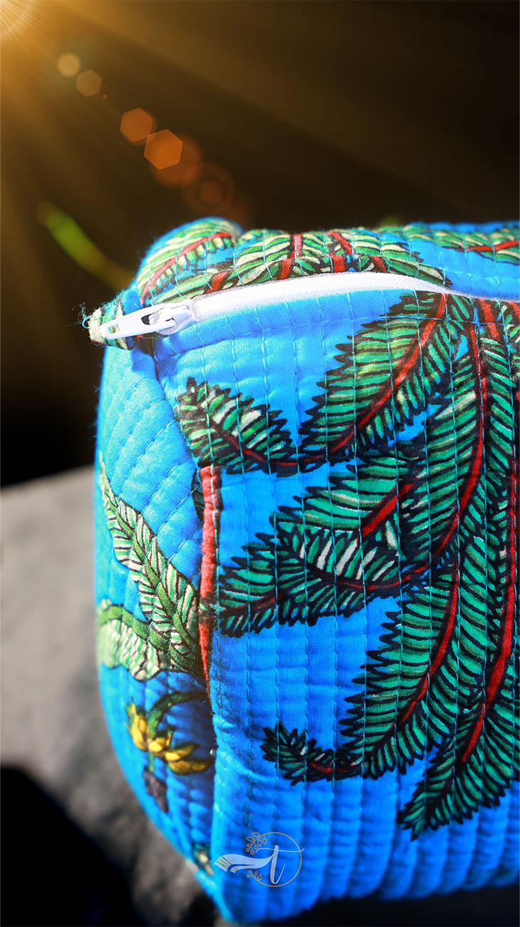 Colorful fabric with leaf pattern on a blue background