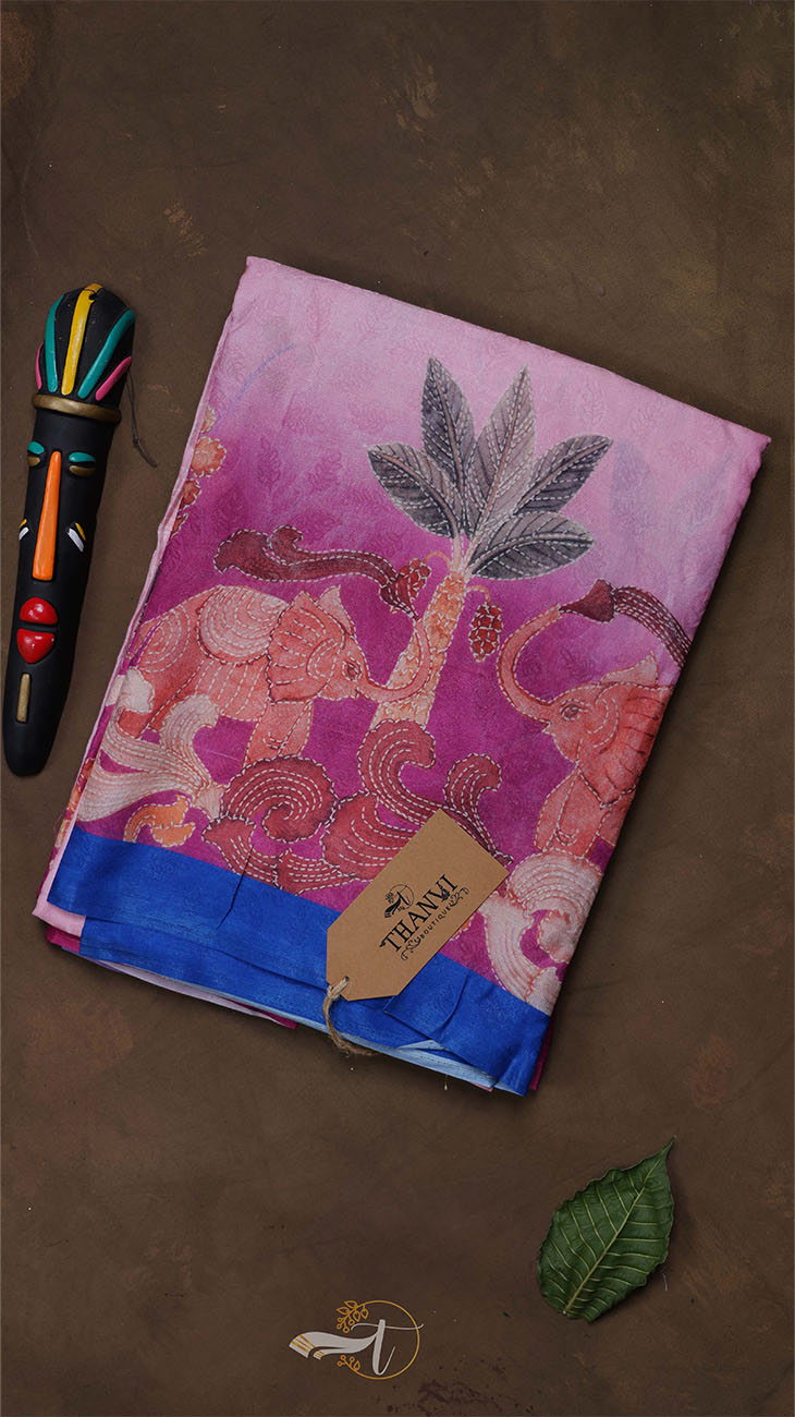 Decorative notebook with elephant and palm tree design on a brown background