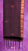 Dark brown scarf with gold border and tassels on a purple background