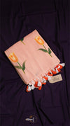 Scarf with tulip pattern and tassels on a dark background