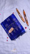 Blue saree with a gold border on a light gray background