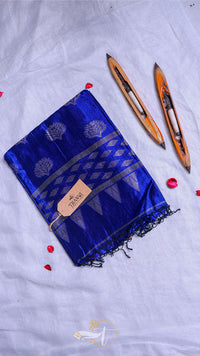 Blue saree with a gold border on a light gray background