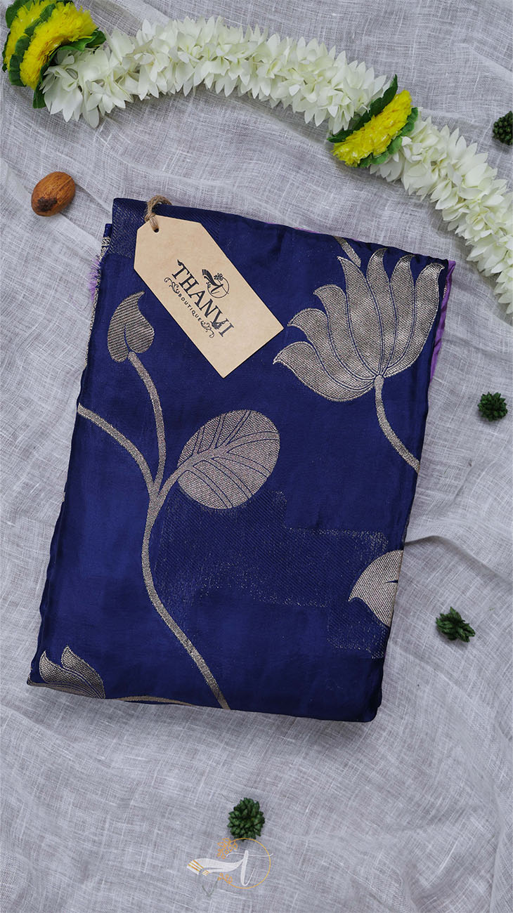 Blue fabric with floral pattern on a gray background