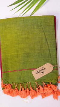 Green fabric with orange fringes and a tag on a white background