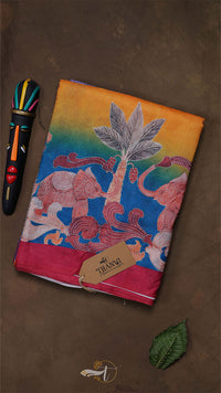 Colorful fabric with elephant design on a brown background