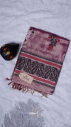 Decorative scarf with floral patterns on a textured surface