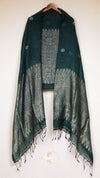 Green and gray patterned scarf with tassels on a white background