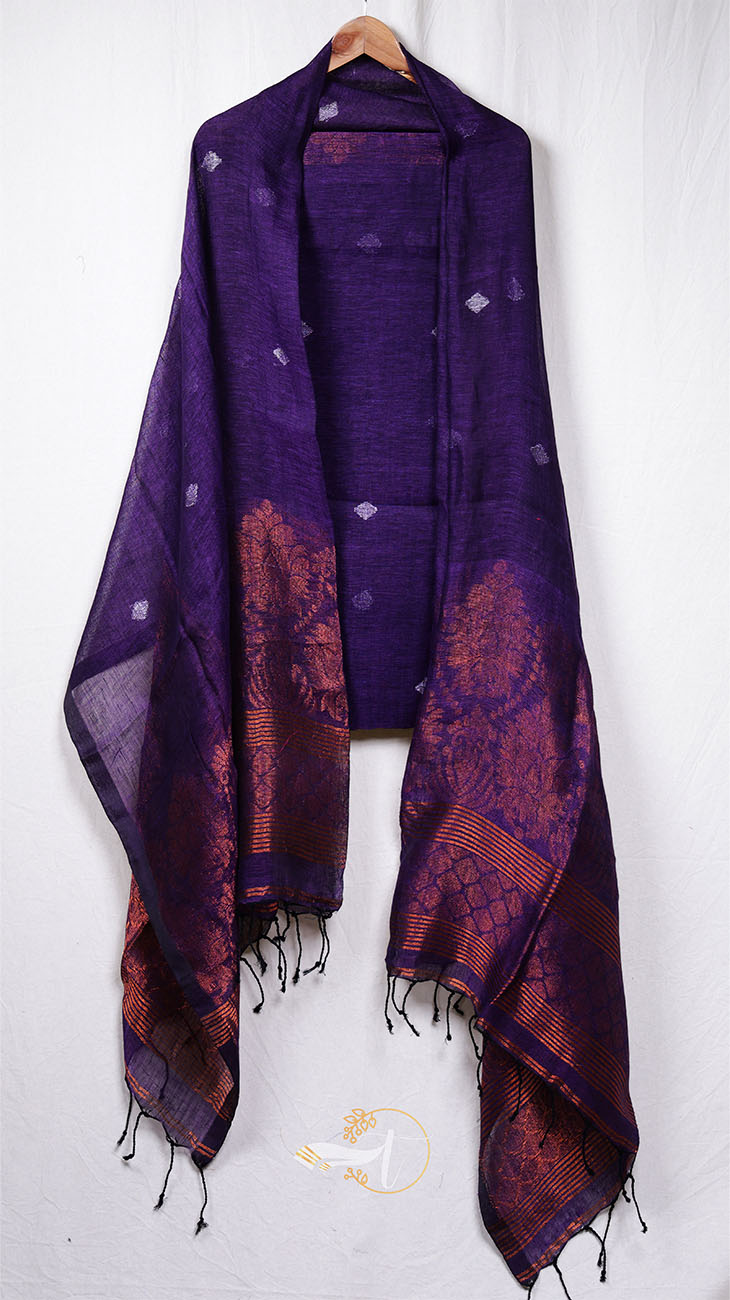 Purple patterned scarf with fringe on a white background