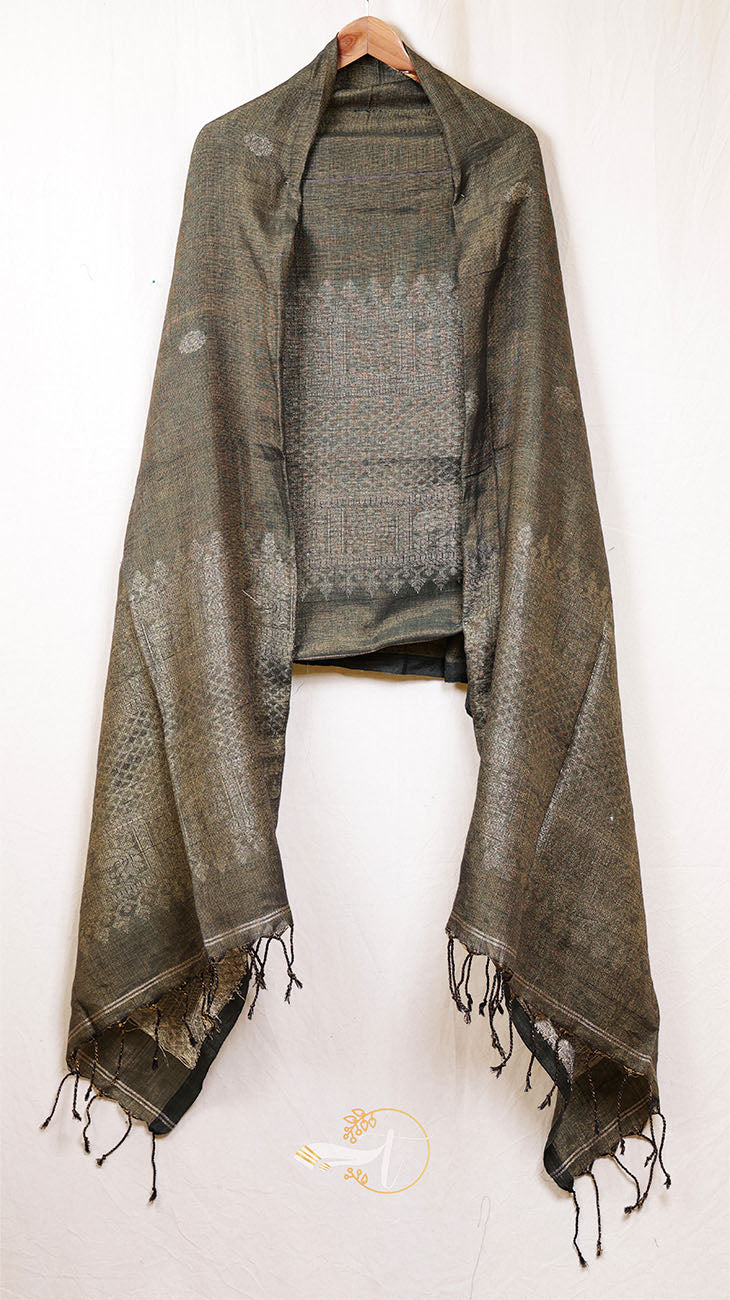 Dark green patterned scarf with fringes on a white background