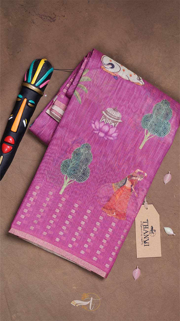 Purple fabric with floral patterns on a brown background
