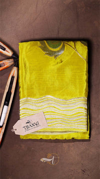 Yellow fabric with white border on a brown background, featuring a 'THANVI' tag.