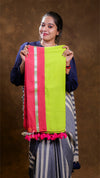 Woman holding a colorful scarf with a brown background