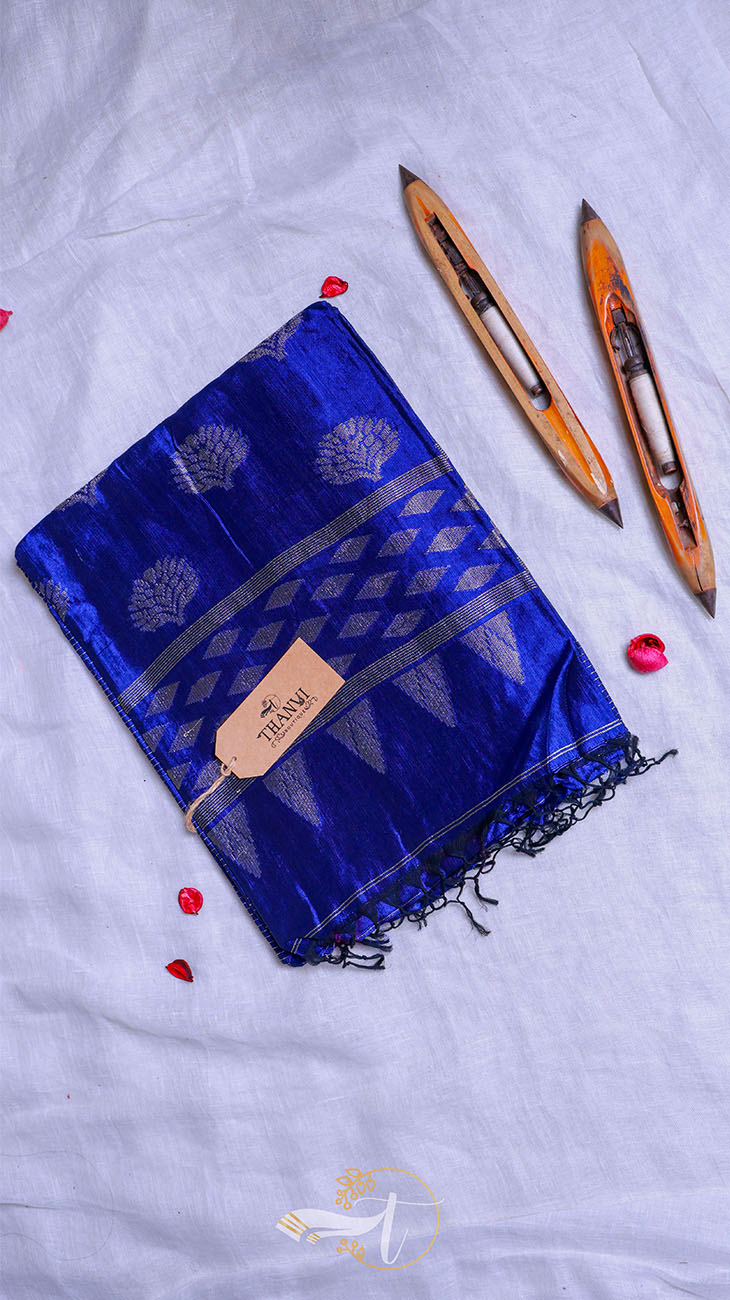 Blue saree with black patterns on a white background