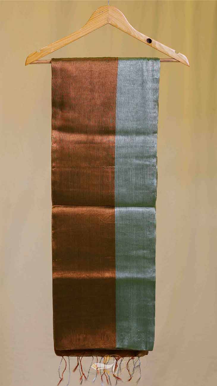 Brown and green striped scarf on a hanger against a beige background