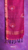 Pink scarf with decorative patterns on a purple background