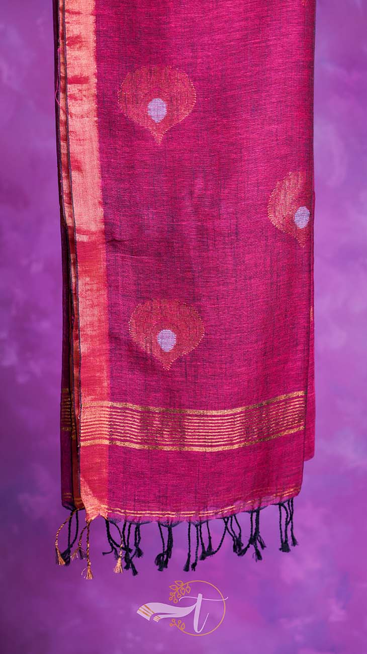 Pink scarf with decorative patterns on a purple background