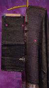 Dark brown fabric with pink buttons on a purple background