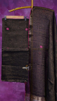 Dark brown fabric with pink buttons on a purple background