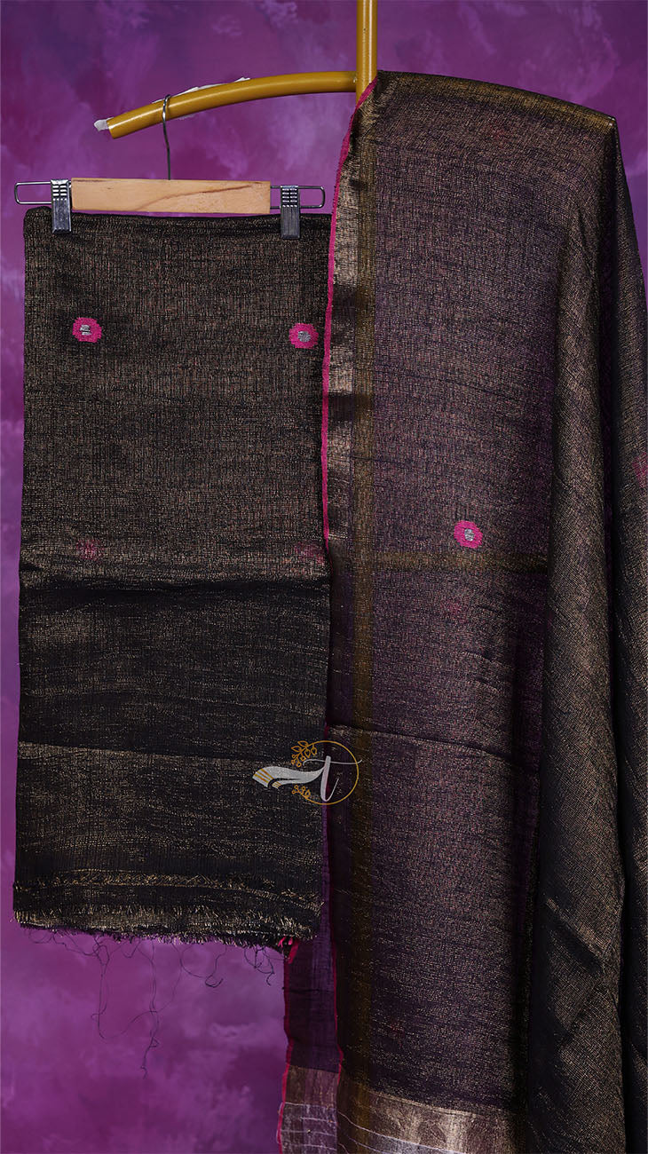 Dark brown fabric with pink buttons on a purple background