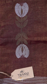Brown fabric with floral pattern and 'THANVI' label