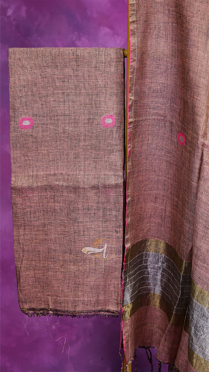 Brown fabric with pink floral patterns on a purple background