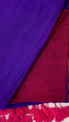 Close-up of purple and red fabric with tassels