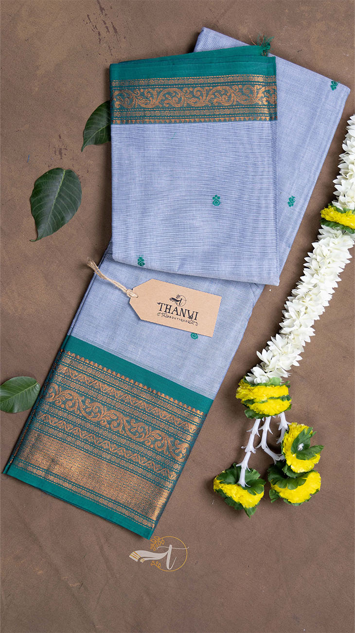 Traditional fabric with decorative patterns on a brown background