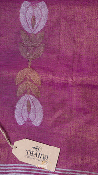 Purple fabric with floral design and a 'THANVI' tag.