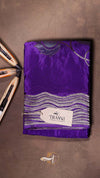 Purple fabric with a brand label on a brown background