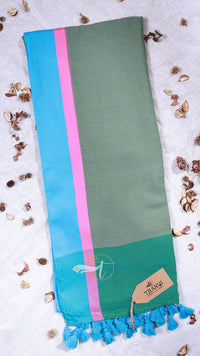 Green scarf with pink and blue stripes on a light background