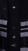 Black fabric with white stripes and geometric patterns