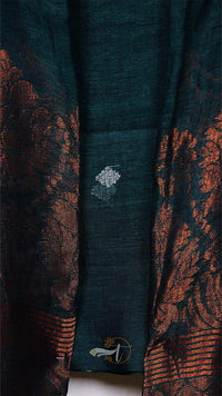 Dark green fabric with orange floral patterns and a white logo in the center.