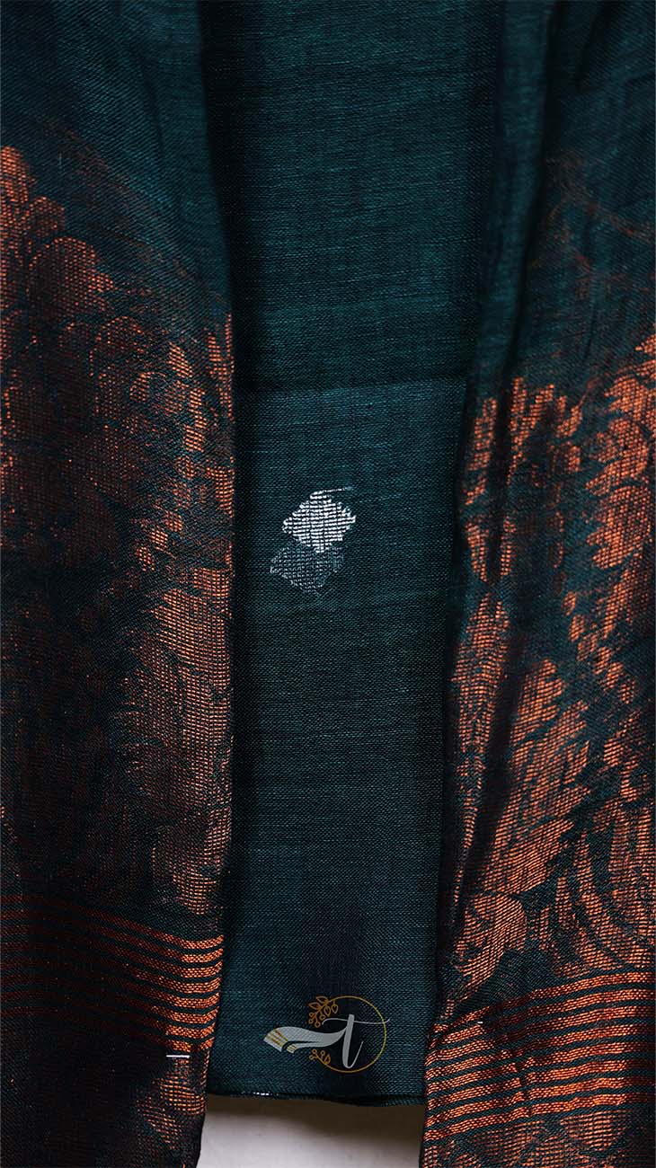 Dark green fabric with orange floral patterns and a white logo in the center.