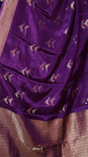 Purple fabric with gold embroidery and patterns