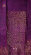 Purple fabric with intricate gold patterns