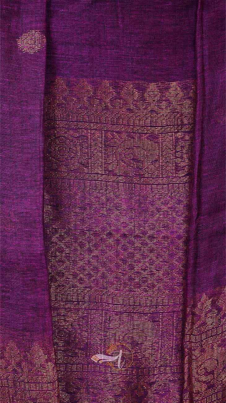 Purple fabric with intricate gold patterns