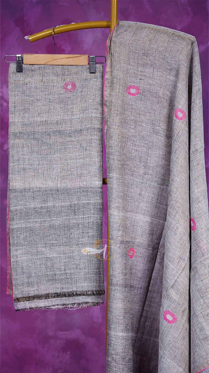 Gray fabric with pink floral patterns on a purple background