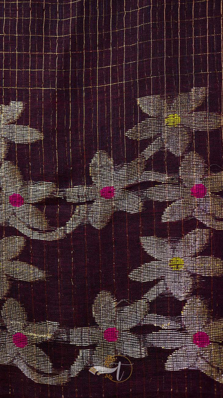 Close-up of floral patterned fabric with a grid background