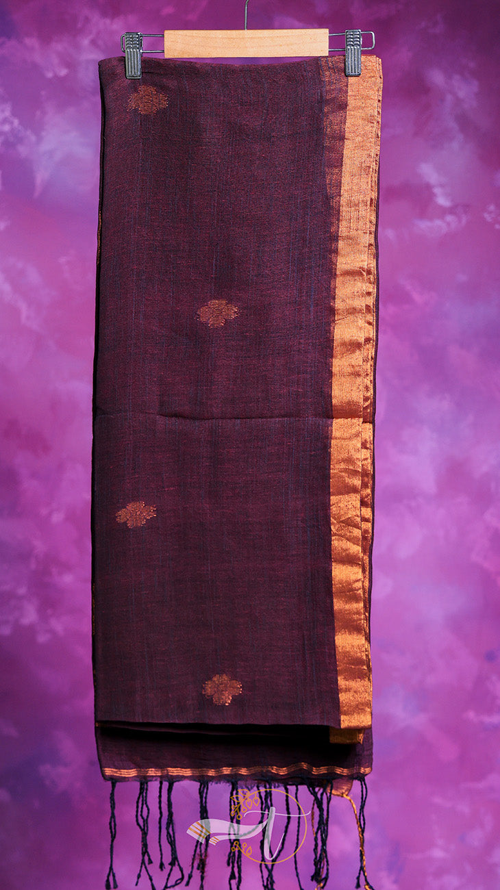 Dark brown scarf with gold patterns on a purple background