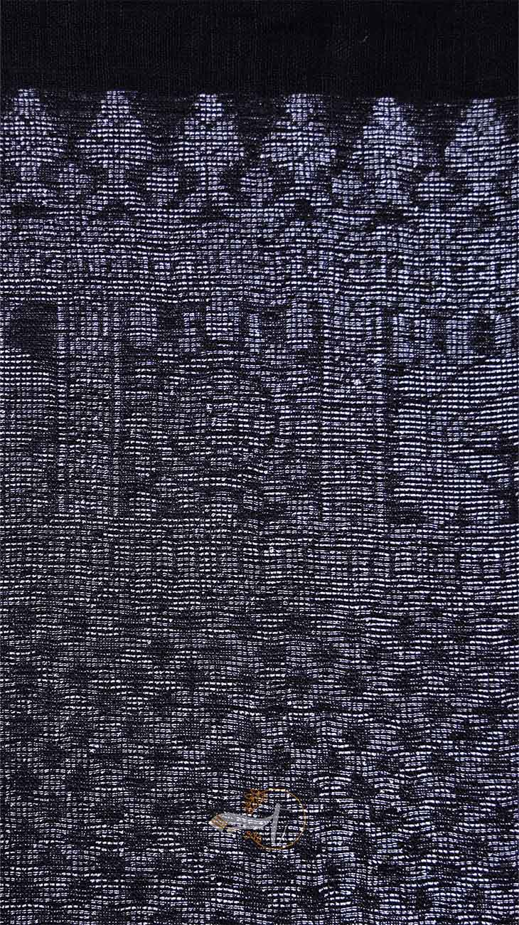 Close-up of a textured fabric with a subtle pattern