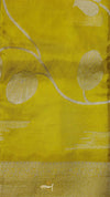 Yellow fabric with white floral patterns