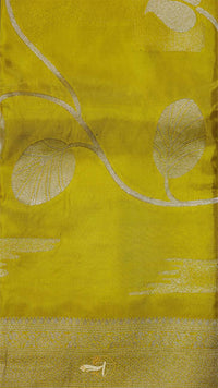 Yellow fabric with white floral patterns