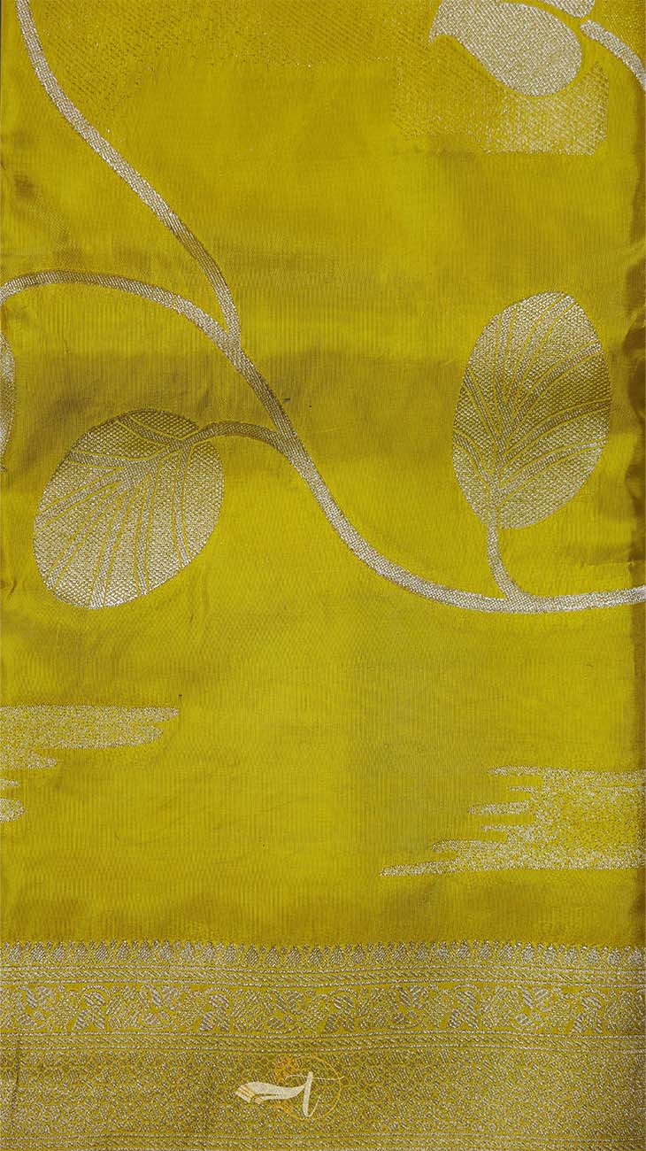 Yellow fabric with white floral patterns