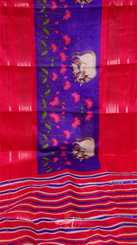 Colorful fabric with floral patterns and a red background