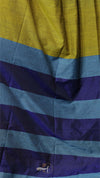 Striped fabric with yellow, blue, and purple colors.