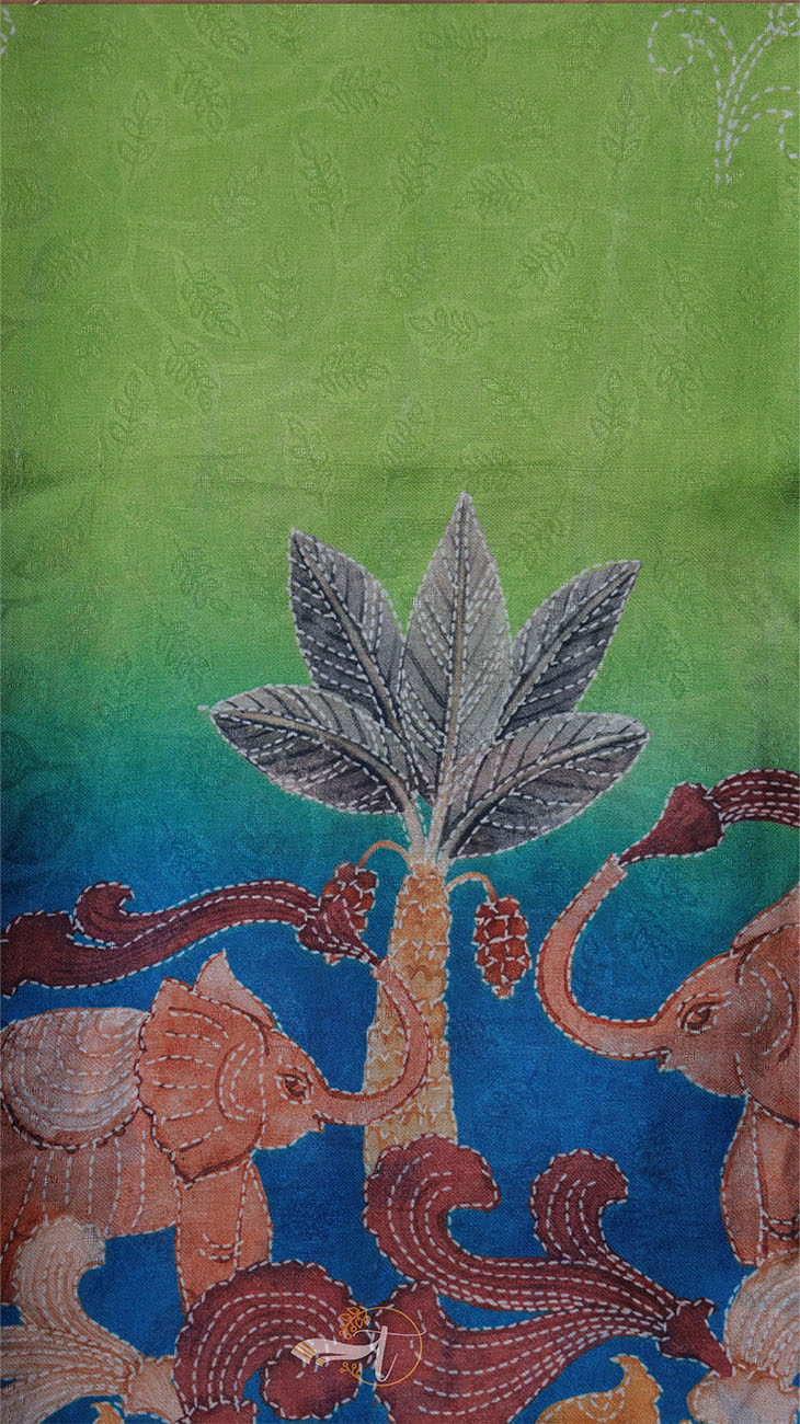 Decorative fabric with elephants and a tree design on a green and blue gradient background