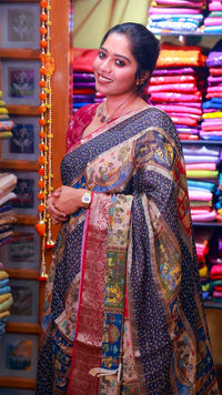 Woman wearing a traditional saree in a fabric store