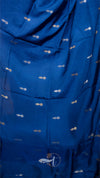 Blue fabric with white fish patterns and a logo in the corner