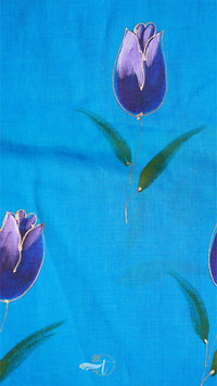 Purple tulip flowers on a blue background